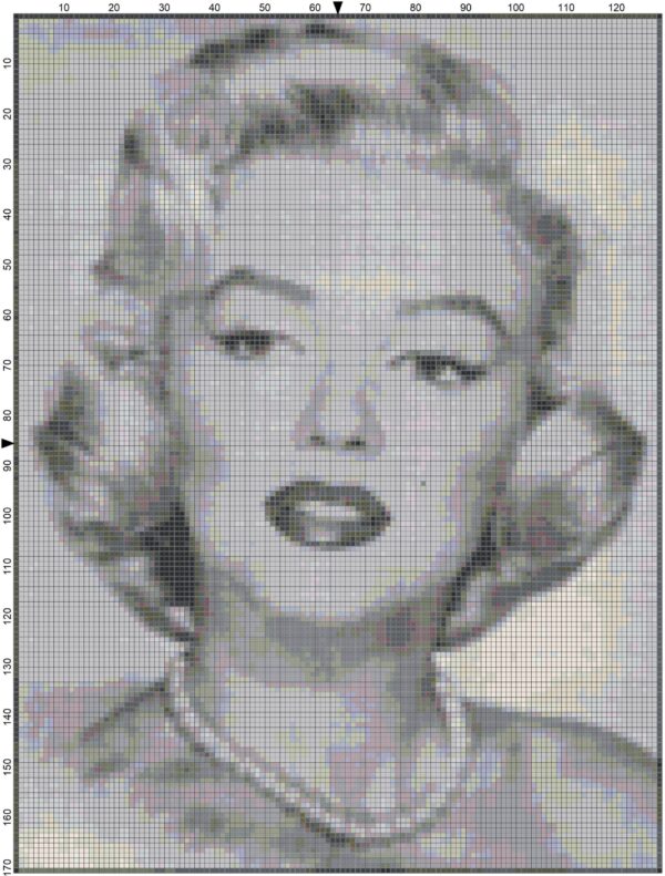 This pattern is of a black and white picture of the late Marilyn Monroe. The pattern calls for about 25 colors of DMC Floss.